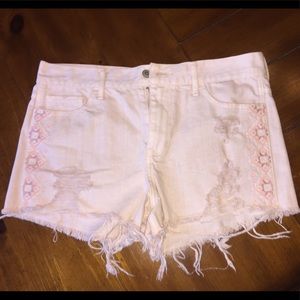 Pink embroidered jean shorts